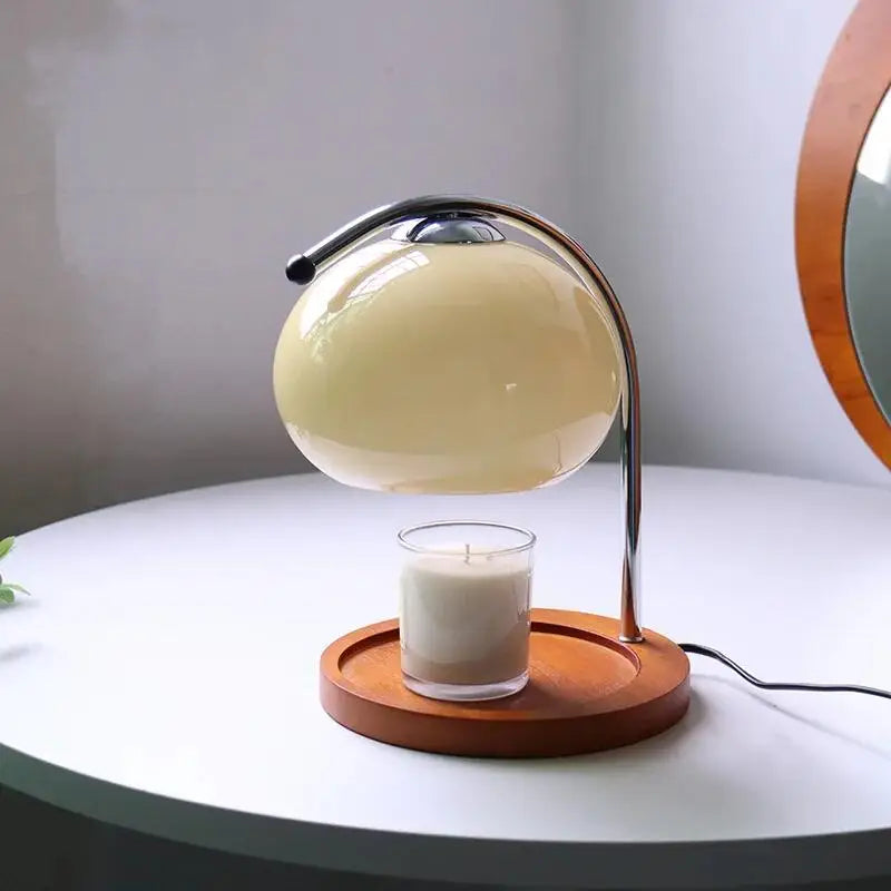Tischlampe mit Kerzenwärmer für gemütliche Homeoffice-Beleuchtung und entspannte Arbeitsatmosphäre.
Elegante LED Tischlampe mit Duftwachswärmer für Büro, Schreibtisch und Homeoffice.
