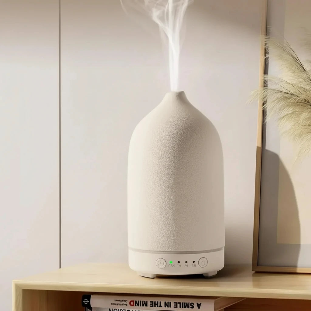 Keramik Aroma Diffuser – mehr Wohlbefinden und Ruhe im Home Office
Dieser stilvolle Aroma Diffuser kombiniert Duft, Luftbefeuchtung und sanfte Beleuchtung für eine entspannte Arbeitsumgebung. Die Ultraschall-Technologie sorgt für leisen Betrieb und gleichmäßige Verteilung ätherischer Öle. Perfekt für mehr Fokus, Entspannung und ein angenehmes Raumklima im Home Office.