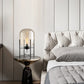 Moderne Tischlampe im nordischen Design für dein Home Office
Diese stilvolle Tischlampe kombiniert minimalistisches Design mit funktionaler Beleuchtung. Der hochwertige Glas-Lampenschirm und das robuste Metall sorgen für eine elegante Optik und langlebige Qualität. Perfekt als Schreibtischlampe im Home Office oder als dekoratives Licht im Wohn- und Schlafzimmer. Dank E27 Fassung kannst du Helligkeit und Lichtfarbe individuell anpassen.
