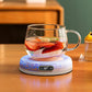 Elektrischer Tassenwärmer mit 4 Temperaturstufen hält Kaffee, Tee oder Kakao konstant warm. Kompakte Heizplatte mit automatischer Abschaltung und modernem Design – ideal für Büro, Homeoffice oder Schreibtisch