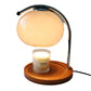 Tischlampe mit Kerzenwärmer für gemütliche Homeoffice-Beleuchtung und entspannte Arbeitsatmosphäre.
Elegante LED Tischlampe mit Duftwachswärmer für Büro, Schreibtisch und Homeoffice.
