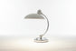 Moderne Tischlampe im Bauhaus- und Nordic-Design – stilvolles Licht für dein Home Office
Diese elegante Tischlampe vereint zeitloses Design mit praktischer Funktionalität. Die verstellbare Lichtausrichtung sorgt für optimalen Komfort beim Arbeiten, während das minimalistische Design jeden Raum optisch aufwertet. Perfekt für ein modernes und gemütliches Home Office