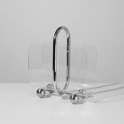 Kompakter, moderner Bücherständer zur stilvollen Aufbewahrung von Büchern, Zeitschriften und Dokumenten im Homeoffice oder Wohnbereich. Das minimalistische Design sorgt für Ordnung und eine dekorative Präsentation auf Schreibtisch, Regal oder Couchtisch. Leicht, platzsparend und flexibel einsetzbar – ideal für ein aufgeräumtes und modernes Ambiente.