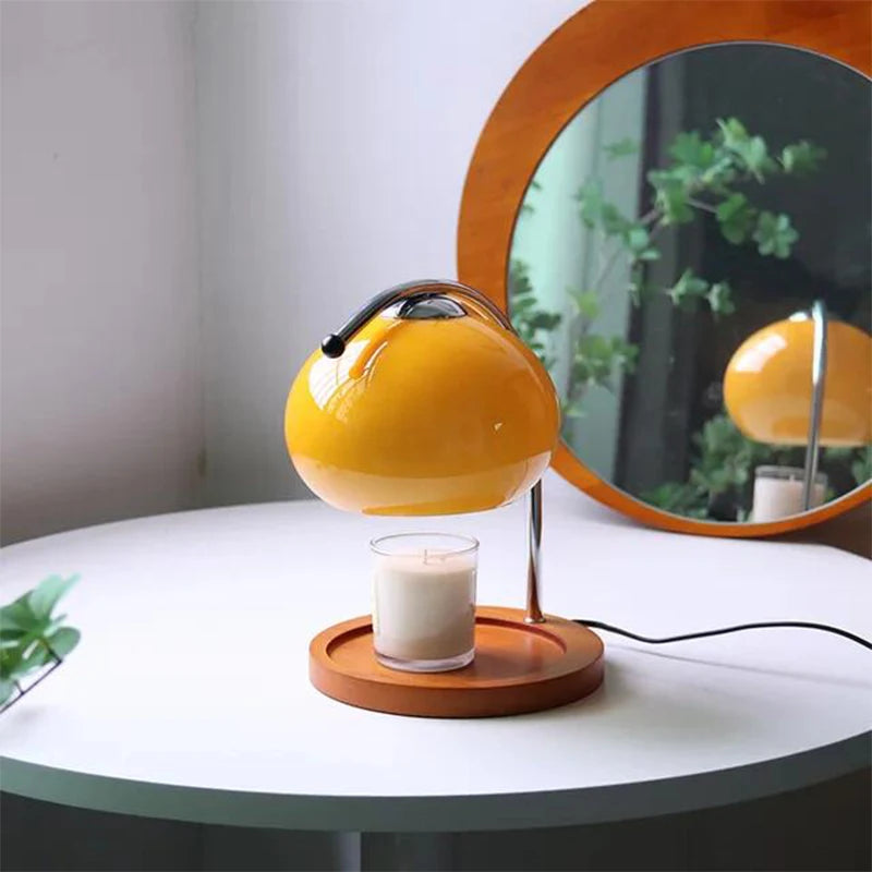 Tischlampe mit Kerzenwärmer für gemütliche Homeoffice-Beleuchtung und entspannte Arbeitsatmosphäre.
Elegante LED Tischlampe mit Duftwachswärmer für Büro, Schreibtisch und Homeoffice.
