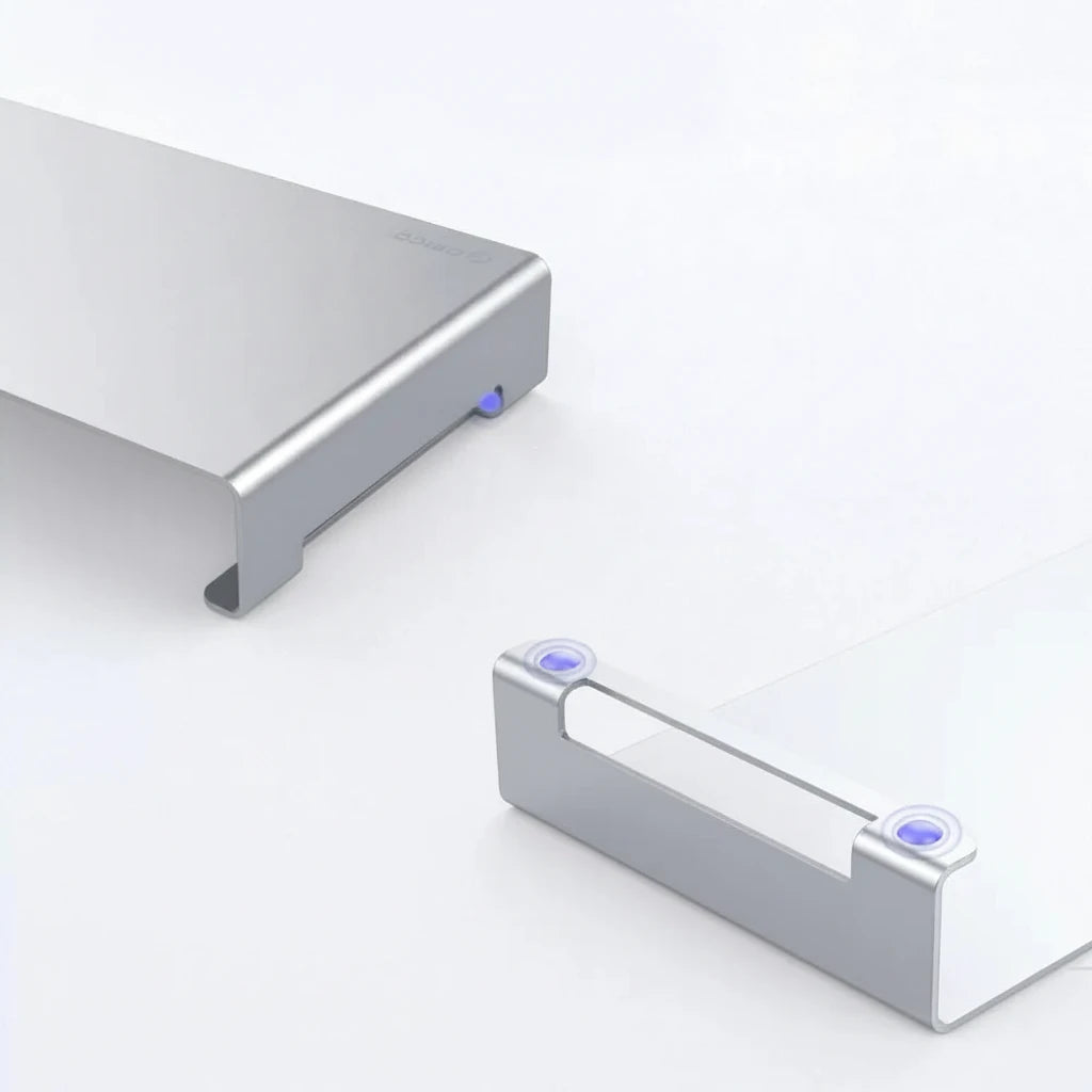 ORICO KCS1 Monitorständer aus Aluminium für eine ergonomische Bildschirmhöhe und einen aufgeräumten Arbeitsplatz. Hebt Laptop oder Monitor auf Augenhöhe, entlastet Nacken und Rücken und schafft zusätzlichen Stauraum unter dem Ständer. Integriertes Kabelmanagement sorgt für Ordnung, das minimalistische Aluminium-Design passt perfekt ins Homeoffice oder Büro und ist kompatibel mit MacBook, Lenovo, Dell und weiteren Geräten.